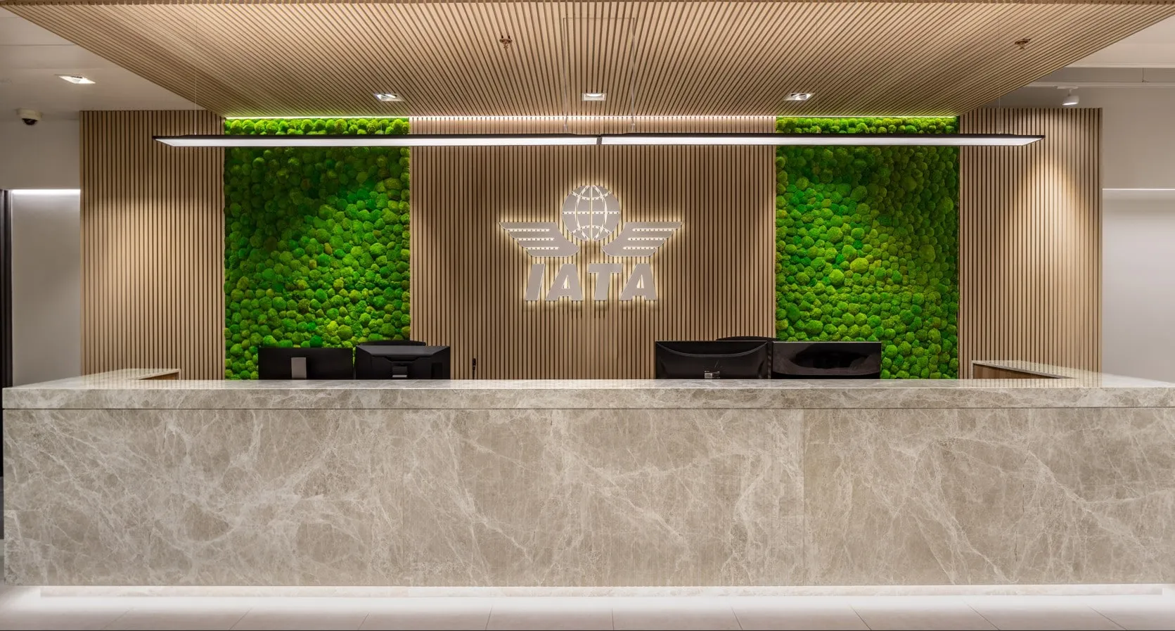 IATA reception desk in veined grey marble, Geneva Airport