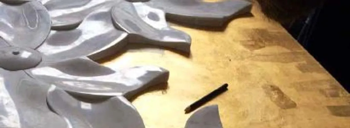 Freshly cut inlay pieces on the workbench